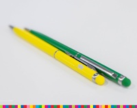 żółty długopis oraz zielony długopis leżą obok siebie