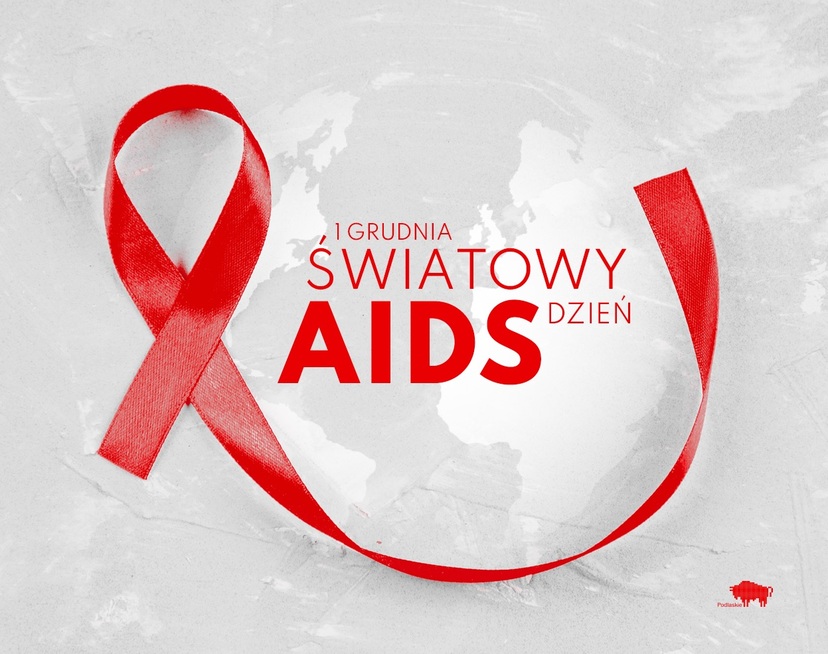Grafika z tekstem Światowy Dzień AIDS z czerwoną wstążką obok. W tle mapa świata