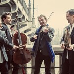 Czterech mężczyzn z instrumentami